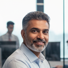 create image of a indian man of age 45 working in IT sector